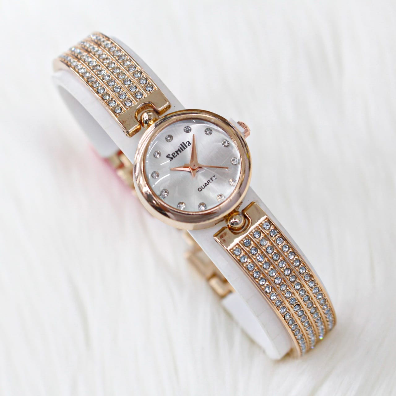 JAM TANGAN SEMILLA GELANG SWAROVSKI BULAT MEWAH logo
